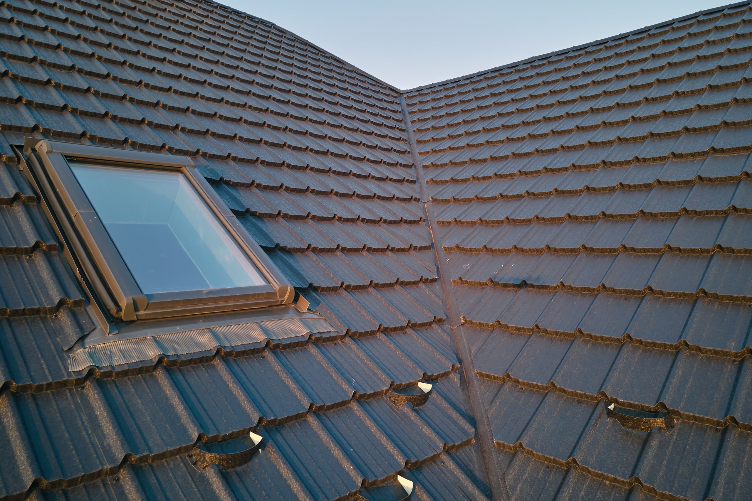 Lead flashing installation around skylight and roof valley